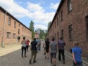 Walking amongst the buildings of the concentration camp